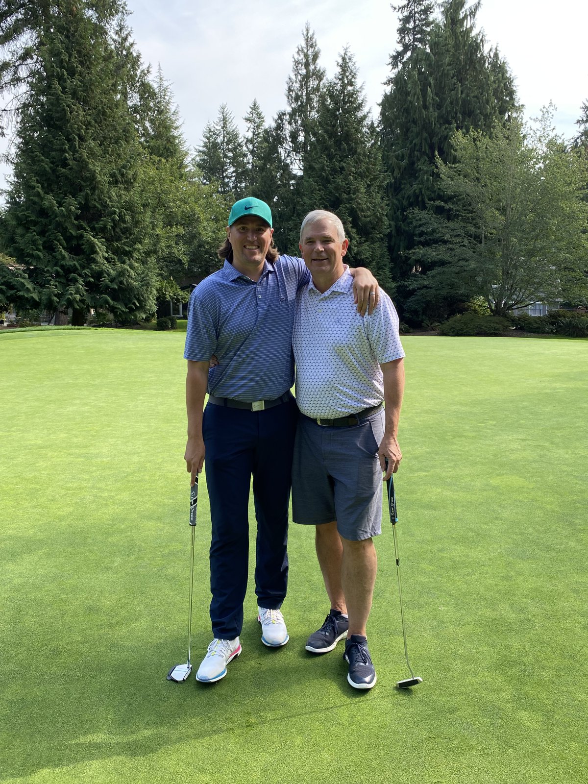 JJ and Trevor Johnson on the green after the 2023 Match Play final